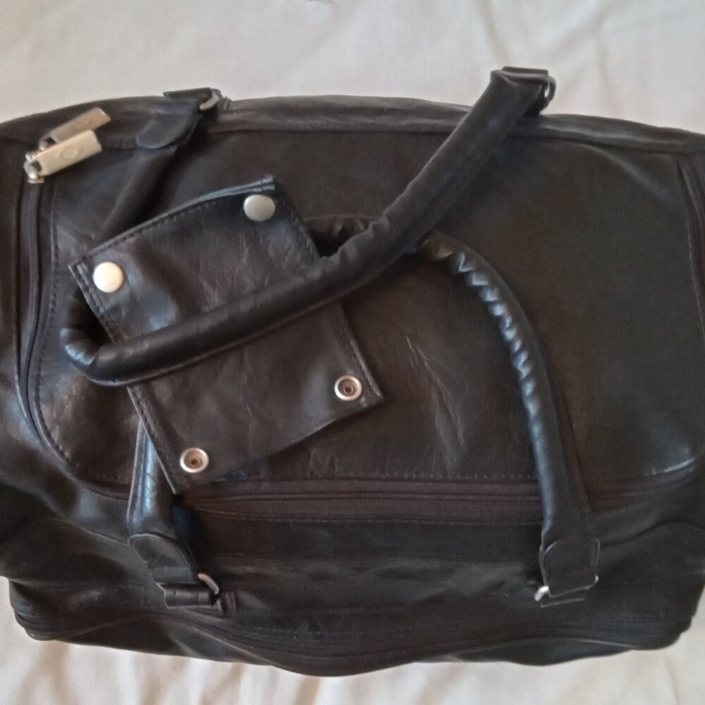 Concourse,  black leather duffel bag, carry on size.